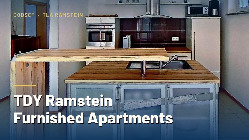 Kitchen with island in a furnished TDY apartment